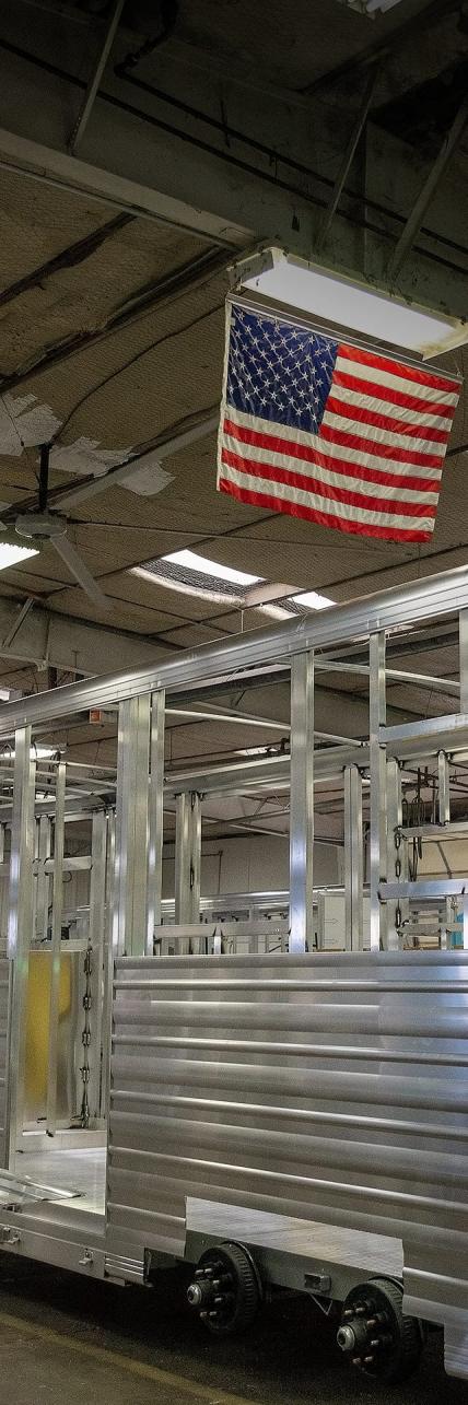 The frame of a Cimarron horse trailer being built in a facility