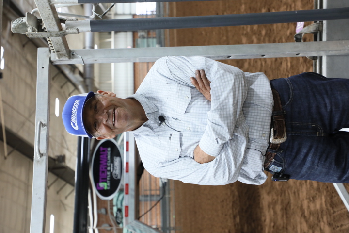 Kirk Stierwalt standing next to his Cimarron trailer.